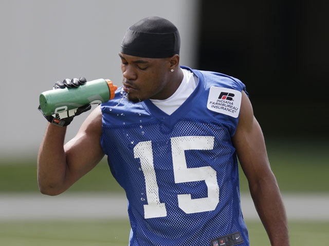 Indianapolis Colts' LaVon Brazill takes a drink of water during NFL practice on May 22, 2013