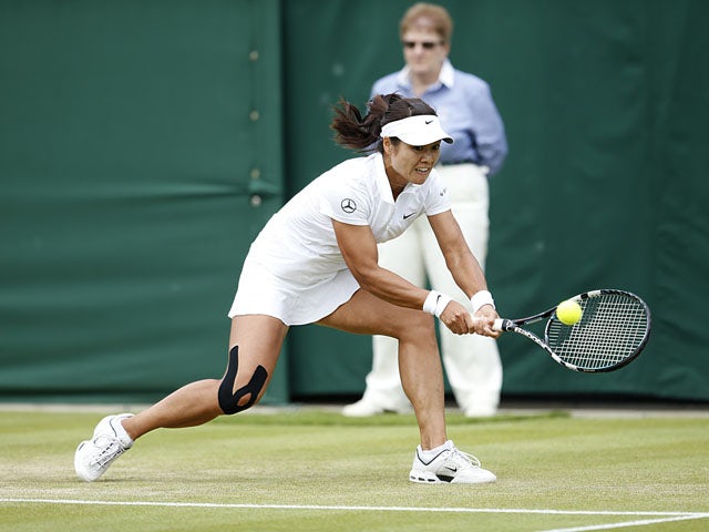 China's Li Na in action against Romania's Simona Halep during day four of the Wimbledon Championships on June 27, 2013