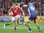 British and Irish Lions Simon Zebo runs past Mitch Inman of the Melbourne Rebels of Australia during their rugby match on June 25, 2013