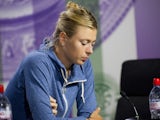 Maria Sharapova looks disappointed after an early exit at Wimbledon on June 26, 2013
