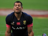 South Africa's Pierre Spies stretches during a training session on June 7, 2013