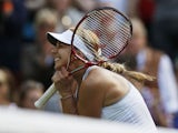 Sabine Lisicki of Germany celebrates after beating Samantha Stosur of Australia during their Women's singles match on June 29, 2013