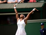 USA's Serena Williams celebrates in her second round match against France's Caroline Garcia at Wimbledon on June 27, 2013