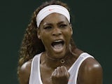 Serena Williams reacts after winning a point against Kimiko Date-Krumm during their Wimbledon match on June 29, 2013
