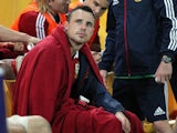 British and Irish Lions' Tommy Bowe sits injured on the bench during the match against Queensland Reds on June 8, 2013