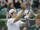 Tommy Haas of Germany waves to the crowd after defeating Dmitry Tursunov of Russia in a Men's first round singles match on June 25, 2013