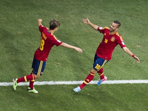 Spain beat Ghana to progress