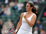 Serbia's Vesna Dolonc celebrates after defeating compatriot Jelena Jankovic in the second round of the Wimbledon Tennis Championships on June 26, 2013