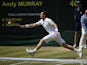Andy Murray stretches to play a shot in the men's final at Wimbledon.