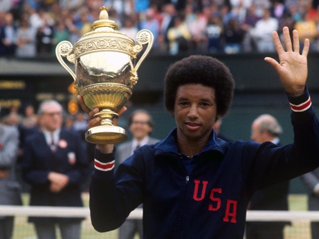 Arthur Ashe with the Wimbledon trophy after winning the men's singles on July 5, 1975