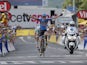 Daniel Martin of Ireland crosses the finish line ahead of Jakob Fuglsang of Denmark to win the ninth stage of the Tour de France on July 7, 2013