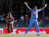India bowler Umesh Yadav appeals successfully for the LBW of West Indies captain Dwayne Bravo on July 5, 2013