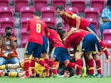 Spain's Jese is mobbed by team mates after scoring the winner against Mexico during the U20 World Cup on July 2, 2013