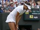 Great Britain's Laura Robson reacts after losing the first set in her match against Estonia's Kaia Kanepi during day seven of the Wimbledon Championships on July 1, 2013
