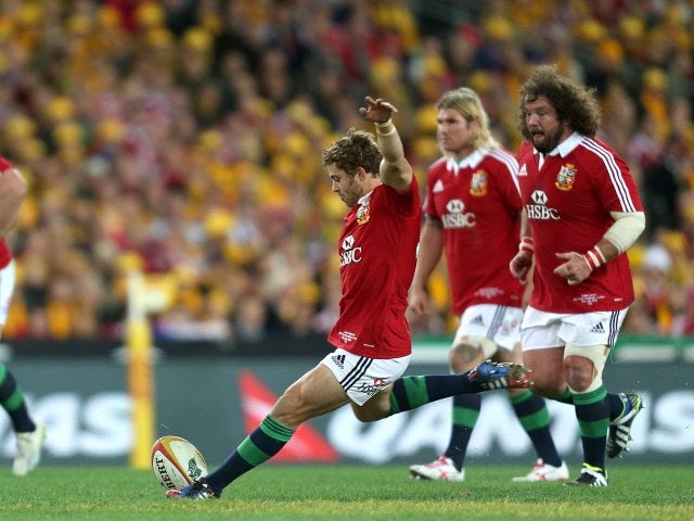 Leigh Halfpenny kicks between the posts for the Lions.