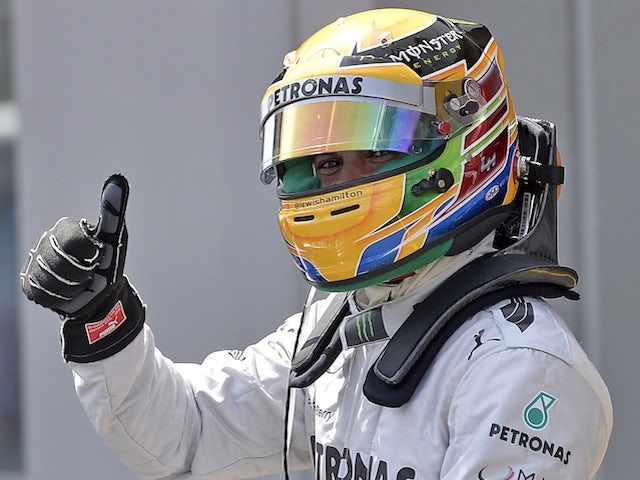 Hamilton claims German GP pole