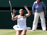 France's Marion Bartoli celebrates after beating Germany's Sabine Lisicki during the 2013 Wimbledon final on July 6, 2013