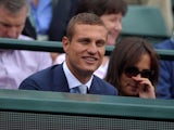 Nemanja Vidic watches the match between Serbia's Novak Djokovic and Czech Republic's Tomas Berdych on July 3, 2013