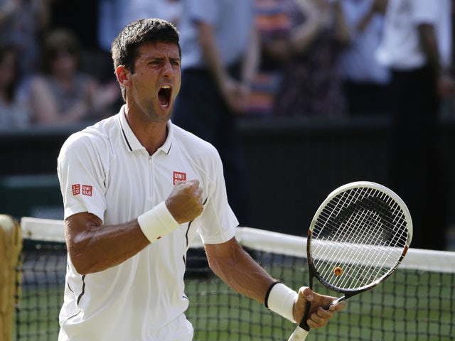Novak Djokovic of Serbia reacts after defeating Juan Martin Del Potro of Argentina in their Men's singles semifinal match at the All England Lawn Tennis Championships on July 5, 2013