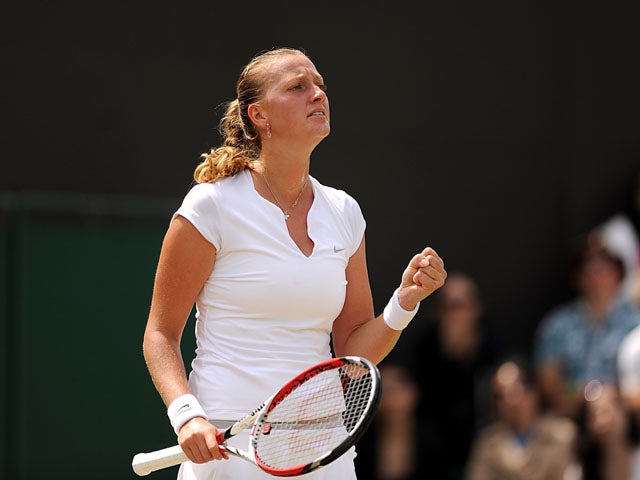 Czech Republic's Petra Kvitova in action against Spain's Carla Suarez Navarro during day seven of the Wimbledon Championships on July 2, 2013