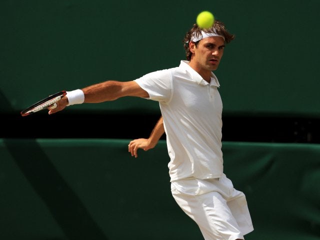 Roger Federer plays a shot during the 2008 Wimbledon final.