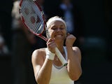 Sabine Lisicki celebrates winning her Wimbledon semi-final against Agnieszka Radwanska on July 4, 2013