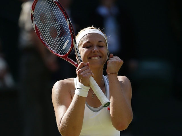 Sabine Lisicki celebrates winning her Wimbledon semi-final against Agnieszka Radwanska on July 4, 2013