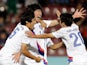 South Korea's Song Juhun celebrates with team mates after scoring the opening goal against Colombia in the U20 World Cup on July 3, 2013