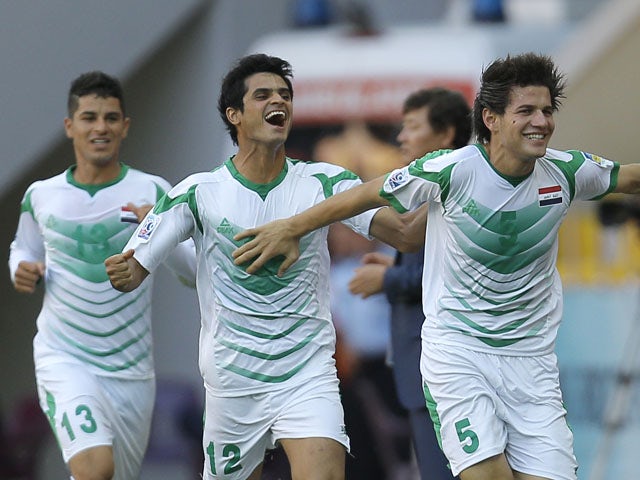 Iraq's Ali Faezcelebrates after scoring his team's opening goal during the Under-20 World Cup quarterfinal soccer match between Iraq and South Korea on July 7, 2013