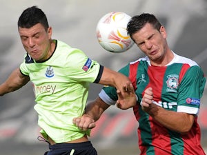 Maritimo's Valentin Roberge challenges for the ball with Newcastle's Haris Vuckic during a Europa League match on September 20, 2012