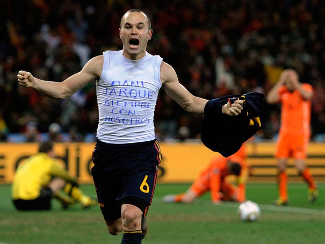 Spain's Andres Iniesta celebrates after scoring during the 2010 World Cup Final on July 11, 2010