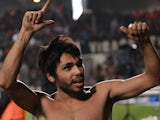 Bordeaux's Benoit Tremoulinas reacts after his team's victory over Marseille on November 18, 2012