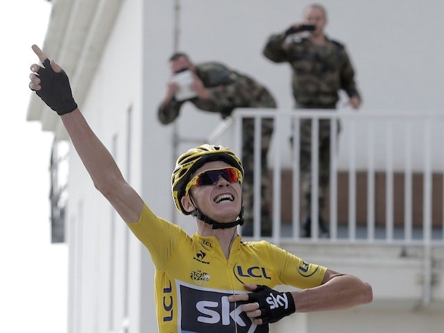 Chris Froome celebrates winning Stage 15 of the Tour de France on July 14, 2013