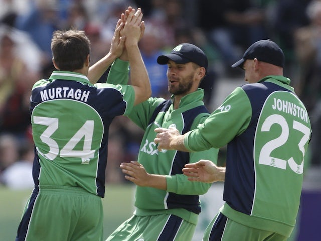 Irish cricketers celebrate a wicket against Pakistan on May 26, 2013