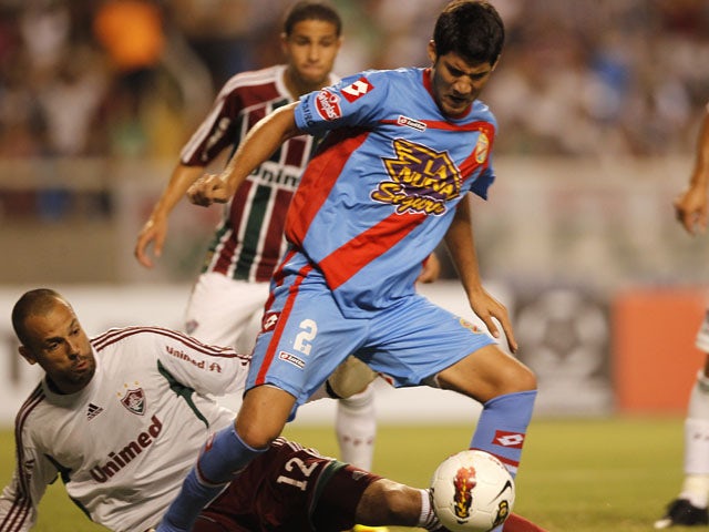 Argentina's Arsenal's Lisandro Lopez during a Copa Libertadores match against Fluminense on February 7, 2012