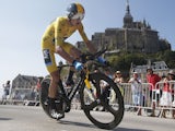 Britain's Chris Froome passes world heritage site Mont-Saint-Michel during the eleventh stage of the Tour de France on July 10, 2013