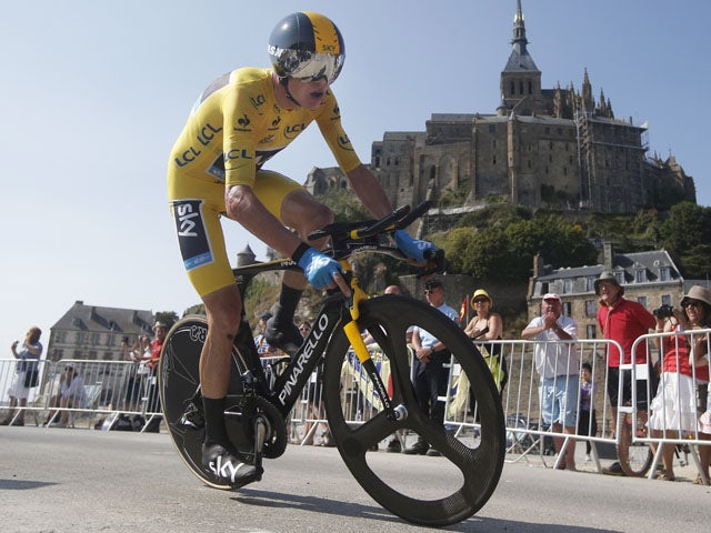 Britain's Chris Froome passes world heritage site Mont-Saint-Michel during the eleventh stage of the Tour de France on July 10, 2013
