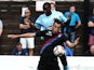 Dagenham & Redbridge's Brian Saah challenges Crystal Palace's Athula Nuhui during a friendly match on July 20, 2013