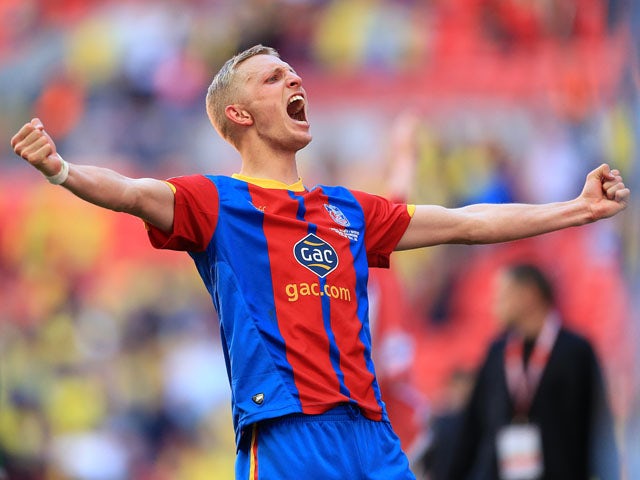 Crystal Palace's Dean Moxey celebrates winning the npower Football League Championship play off final on May 27, 2013