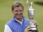 Ernie Els of South Africa holds the Claret Jug trophy after winning the British Open Golf Championship on July 22, 2012