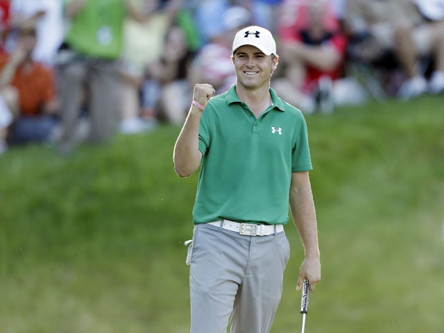Jordan Spieth reacts after winning the John Deere Classic golf tournament on July 14, 2013