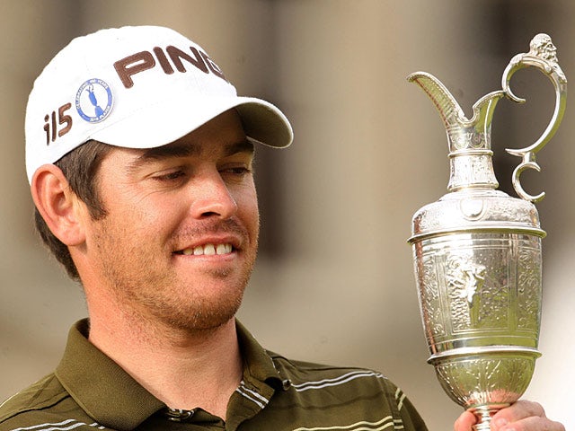 Louis Oosthuizen celebrates with the Open trophy on July 18, 2010