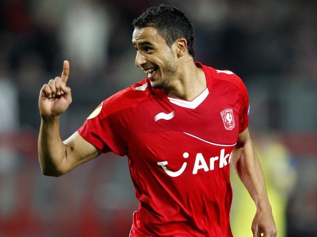 Nacer Chadli celebrates scoring in the Europa League.