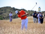 England's Lee Westwood chips out of the rough during day three of the 2013 Open Championship on July 20, 2013