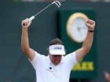 Phil Mickelson celebrates his final putt at The Open on July 21, 2013