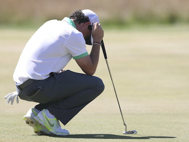 Rory McIlroy acts disappointed after a poor shot at the British Open on July 18, 2013