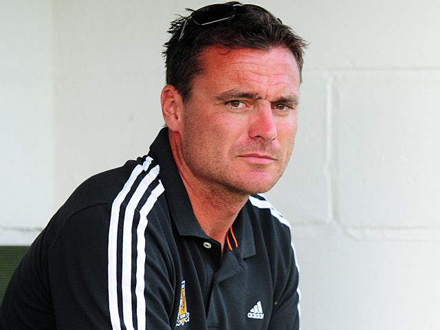 Hull City's new signing goalkeeper Steve Harper watches his team during a pre-season friendly on July 15, 2013