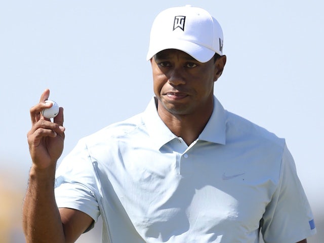 Tiger Woods reacts after a putt at The Open on July 19, 2013