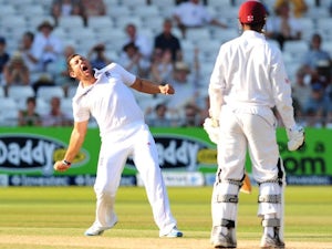 Tim Bresnan celebrates taking a wicket against the West Indies.