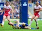 Warrington Wolves' Chris Riley goes over for a try against Hull Kingston Rovers during the Super League match on July 21, 2013